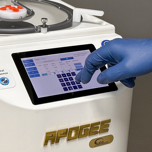 An operator using DataStream™ software to program a recipe into the Cee® Apogee® Benchtop Spin Coater.