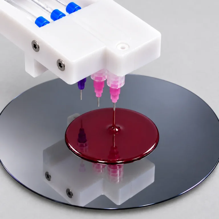 AccuScan arm dispenses a coating stream onto a wafer against a light-gray background